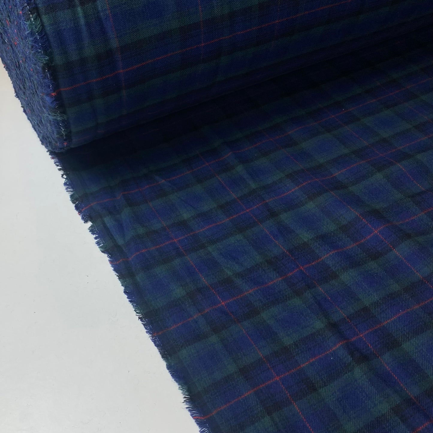 Flanela azul e verde com risca vermelha