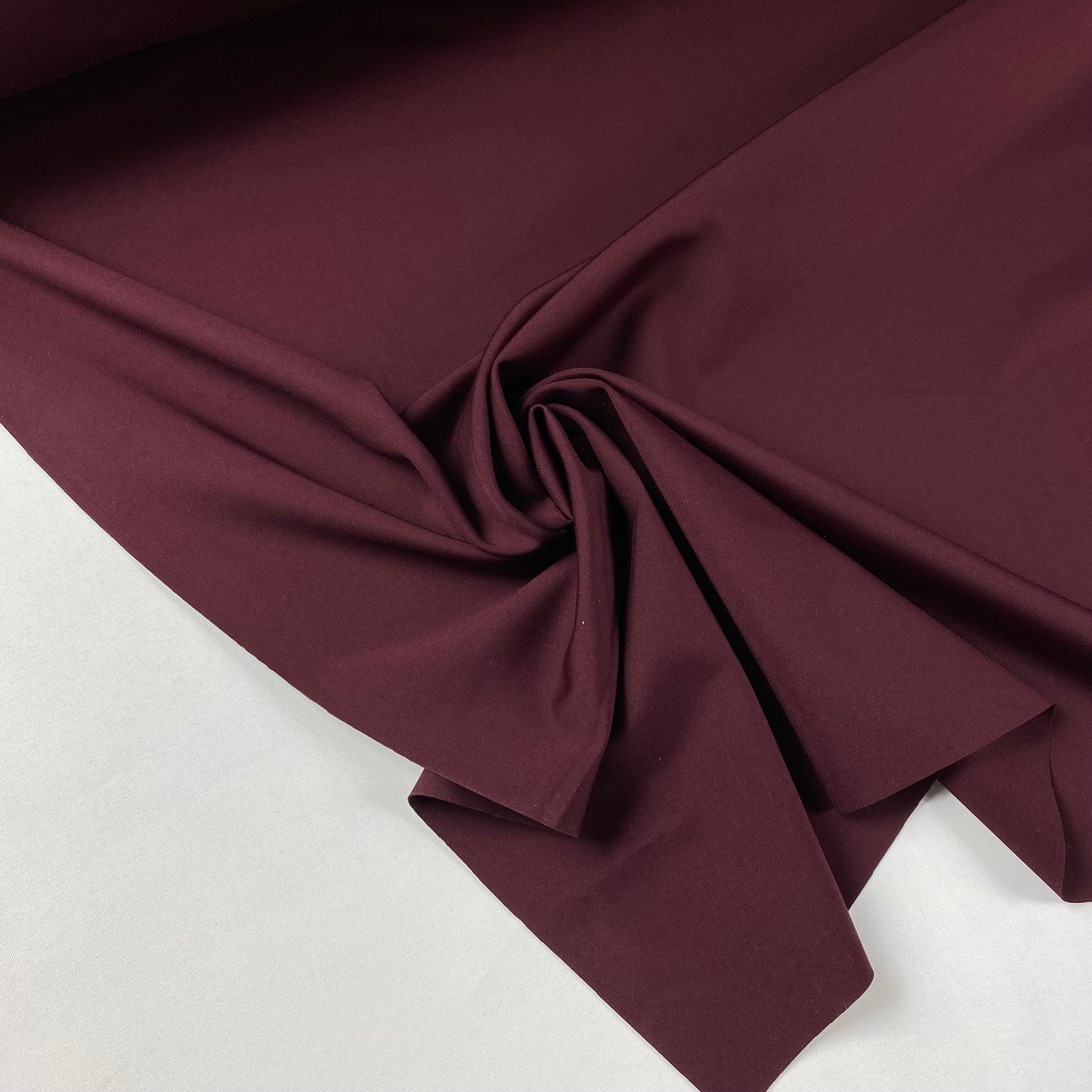 Lycra cor tinto com algum brilho