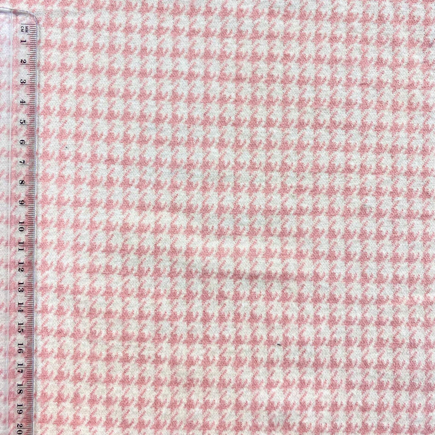 Malha jacquard pied poulet rosa e branca