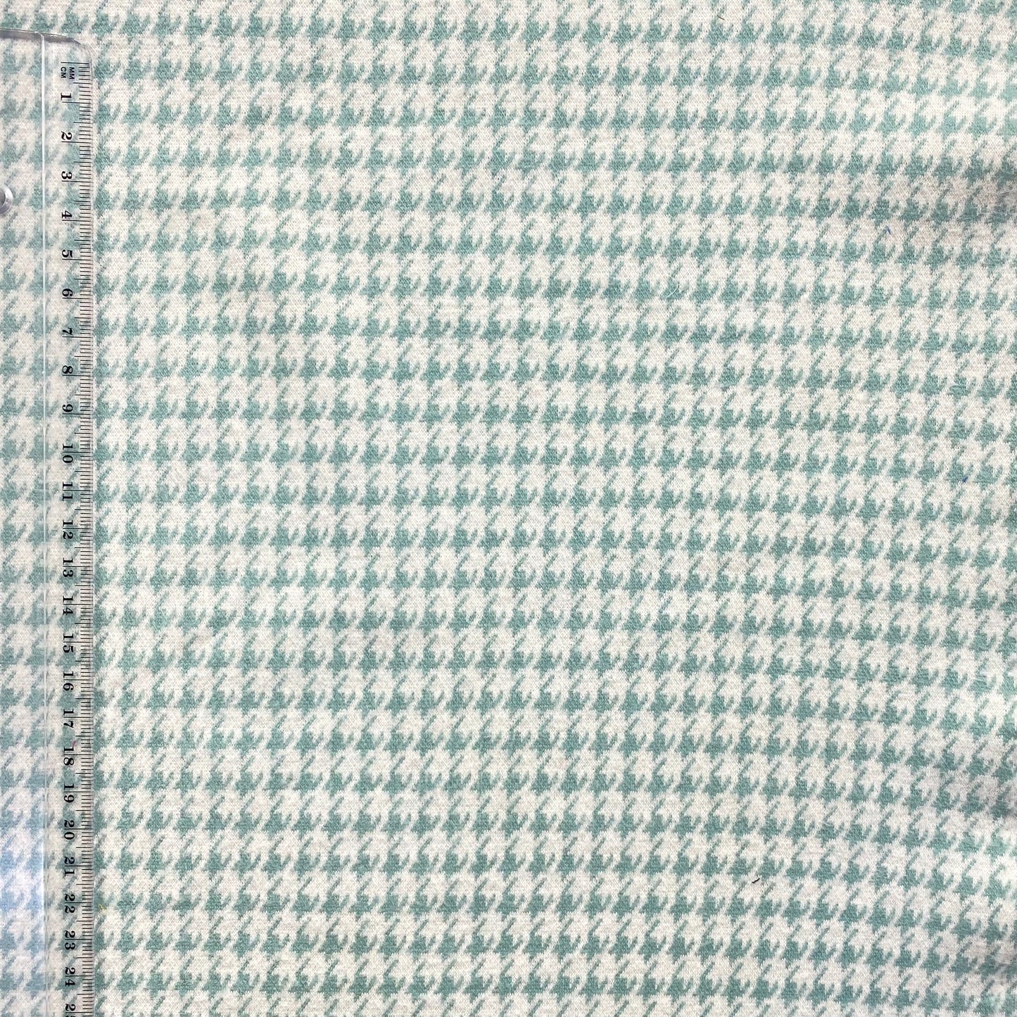 Malha jacquard pied poulet verde e branca