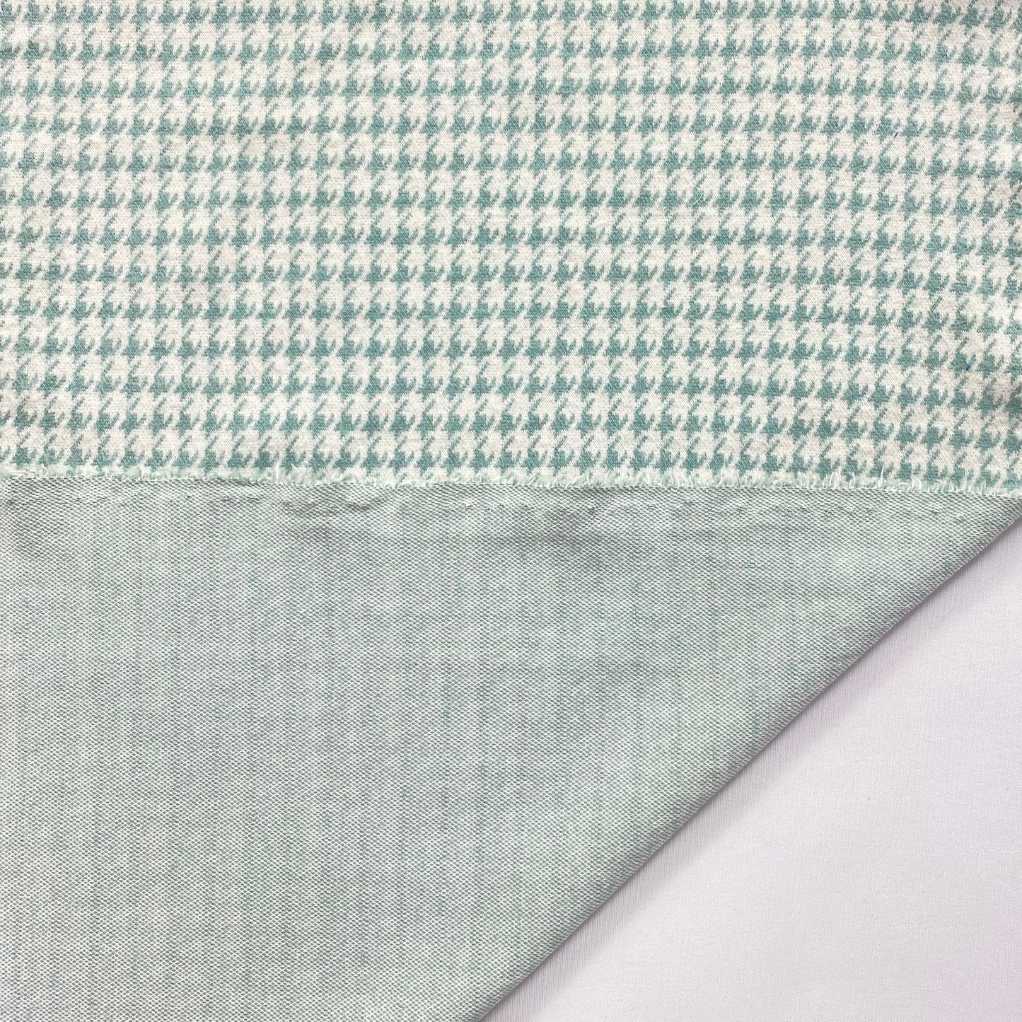 Malha jacquard pied poulet verde e branca
