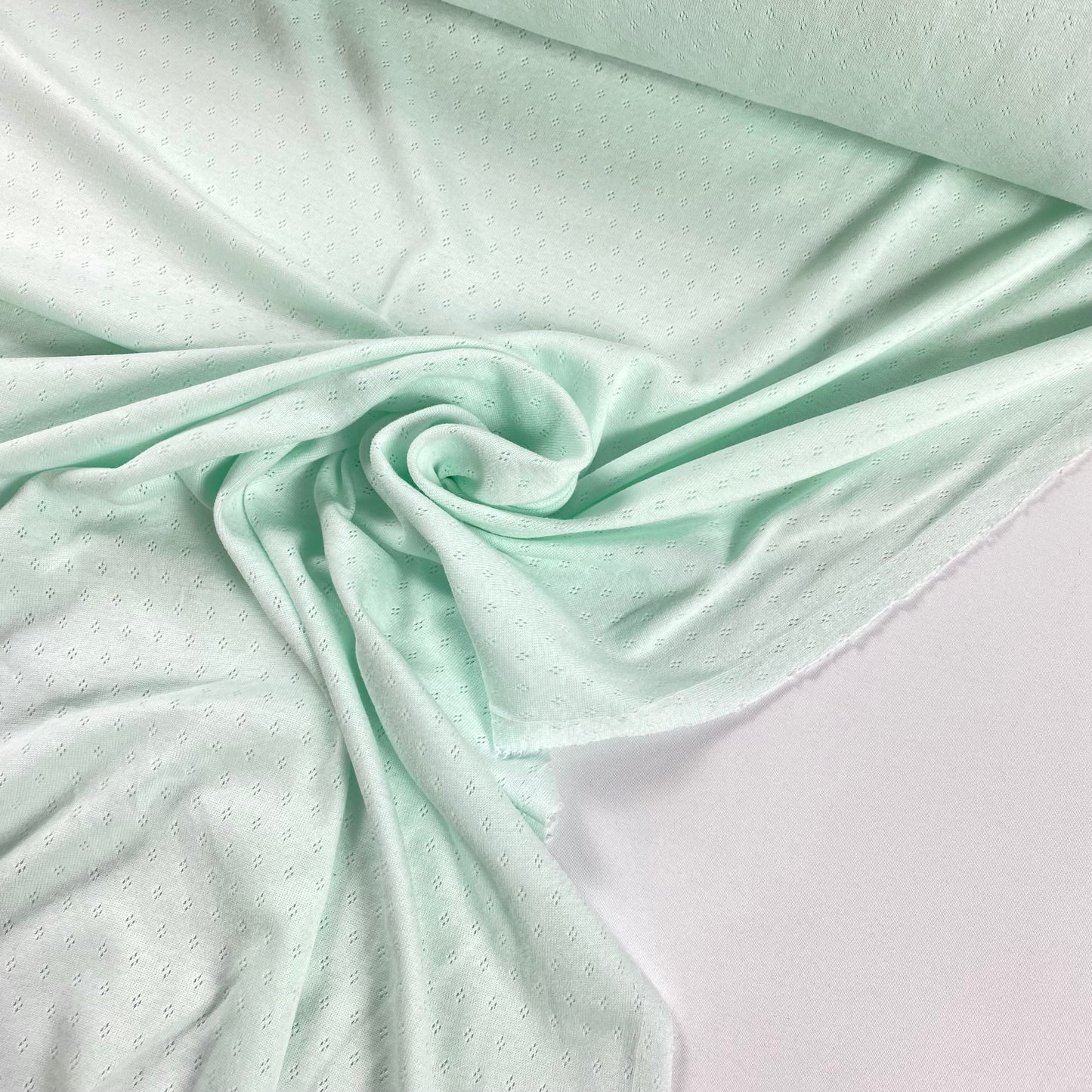 Light green perforated mesh