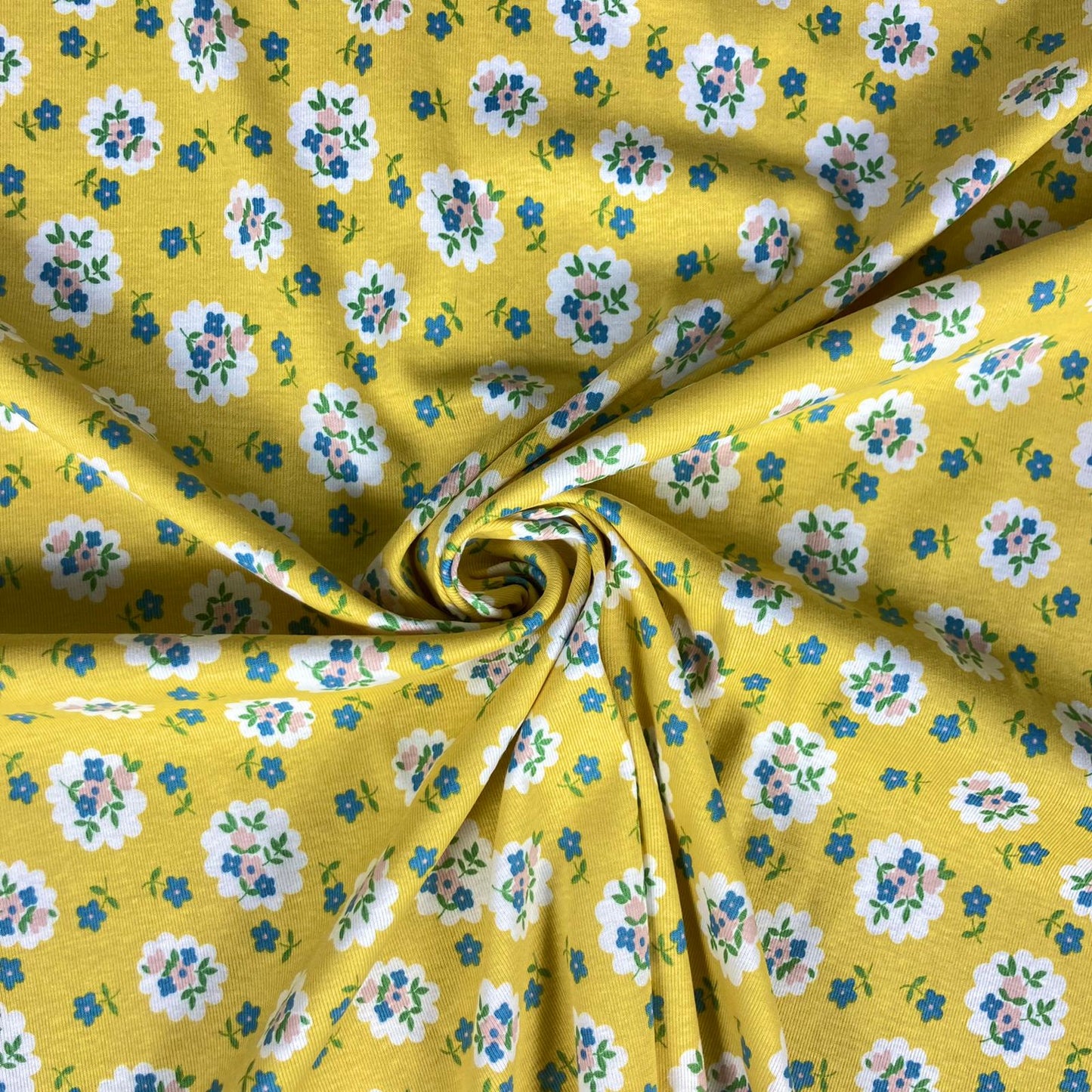 Malha rib 1x1 com flores fundo amarelo