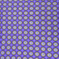 Tejido de punto lycra con fondo morado y flores verdes y lilas.