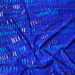 Lycra estampada de color azul con detalles de purpurina.