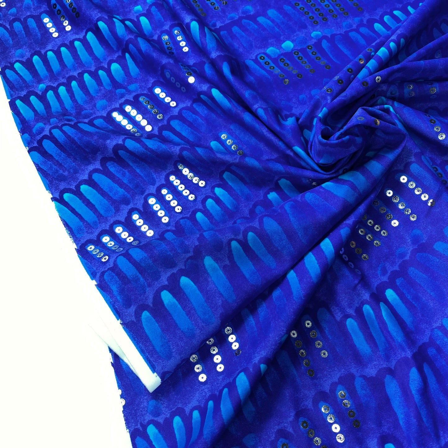 Lycra estampada de color azul con detalles de purpurina.