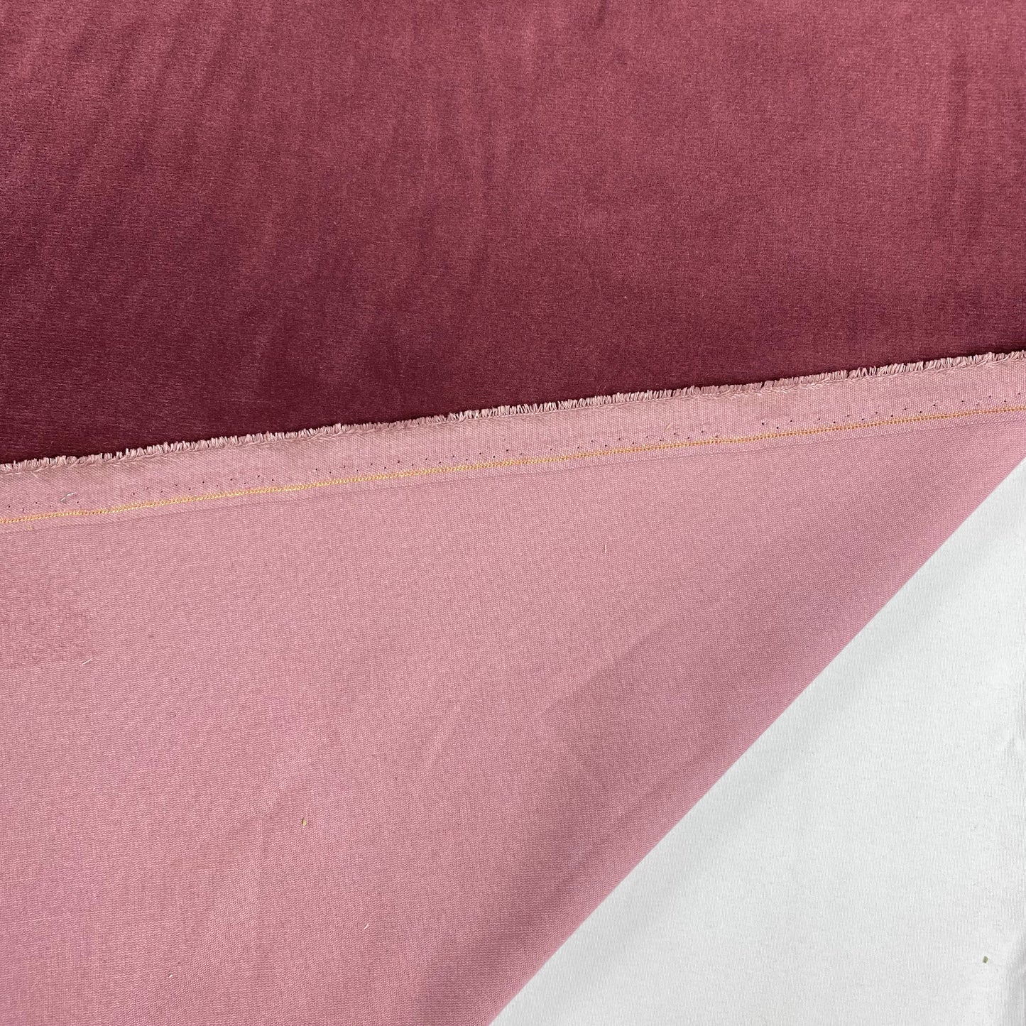 Terciopelo 100% algodón, color rosa viejo.