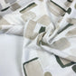 Linho branco com formas beges e verdes