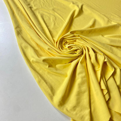 Tejido de punto tipo suplex amarillo pastel