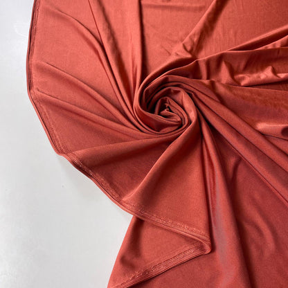 Cobre brillante de licra