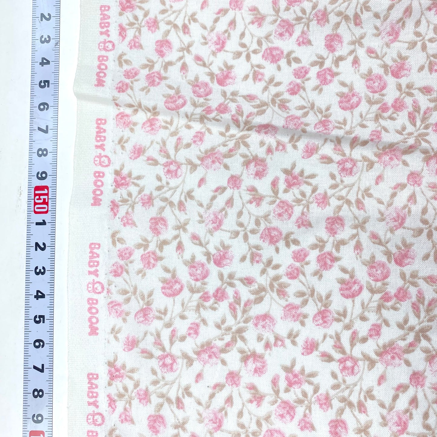Popelina 100% algodón blanca con flores rosas