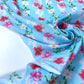 Popelín 100% Algodón Azul Claro Con Flores Rojas y Rosas