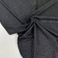 Lycra negra con purpurina