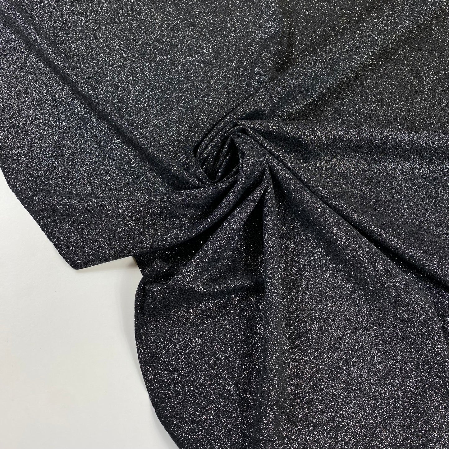 Lycra negra con purpurina