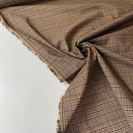 Tartán negro, dorado y marrón