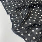 Voile negro con lunares blancos