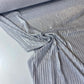 Tejido de punto acanalado con lurex plata.
