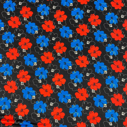 Black viscose jersey with blue and red flowers