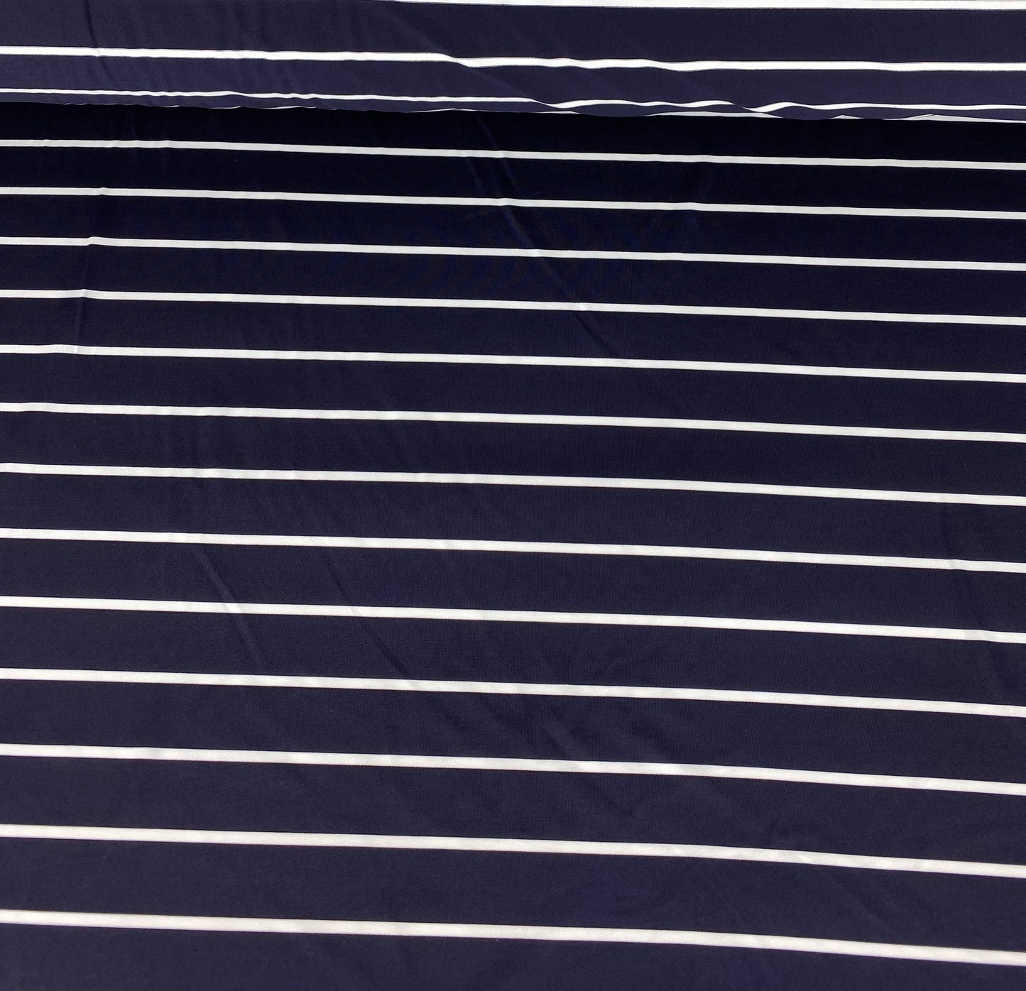 Navy blue lycra with white stripes