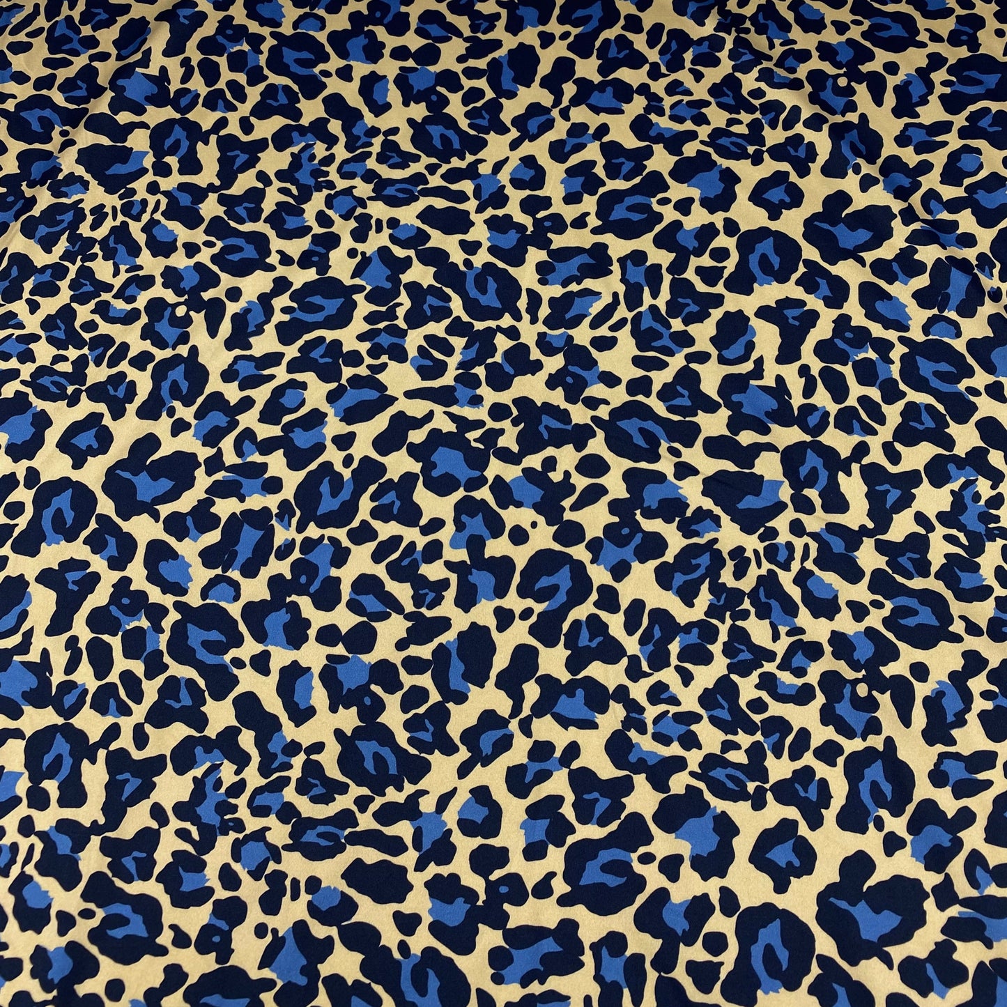 Lycra estampado tigre lunares azules