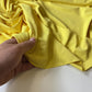 Tejido de punto tipo suplex amarillo pastel