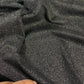 Lycra negra con purpurina