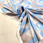 Lycra padrão geométrico azul, cinza e branco