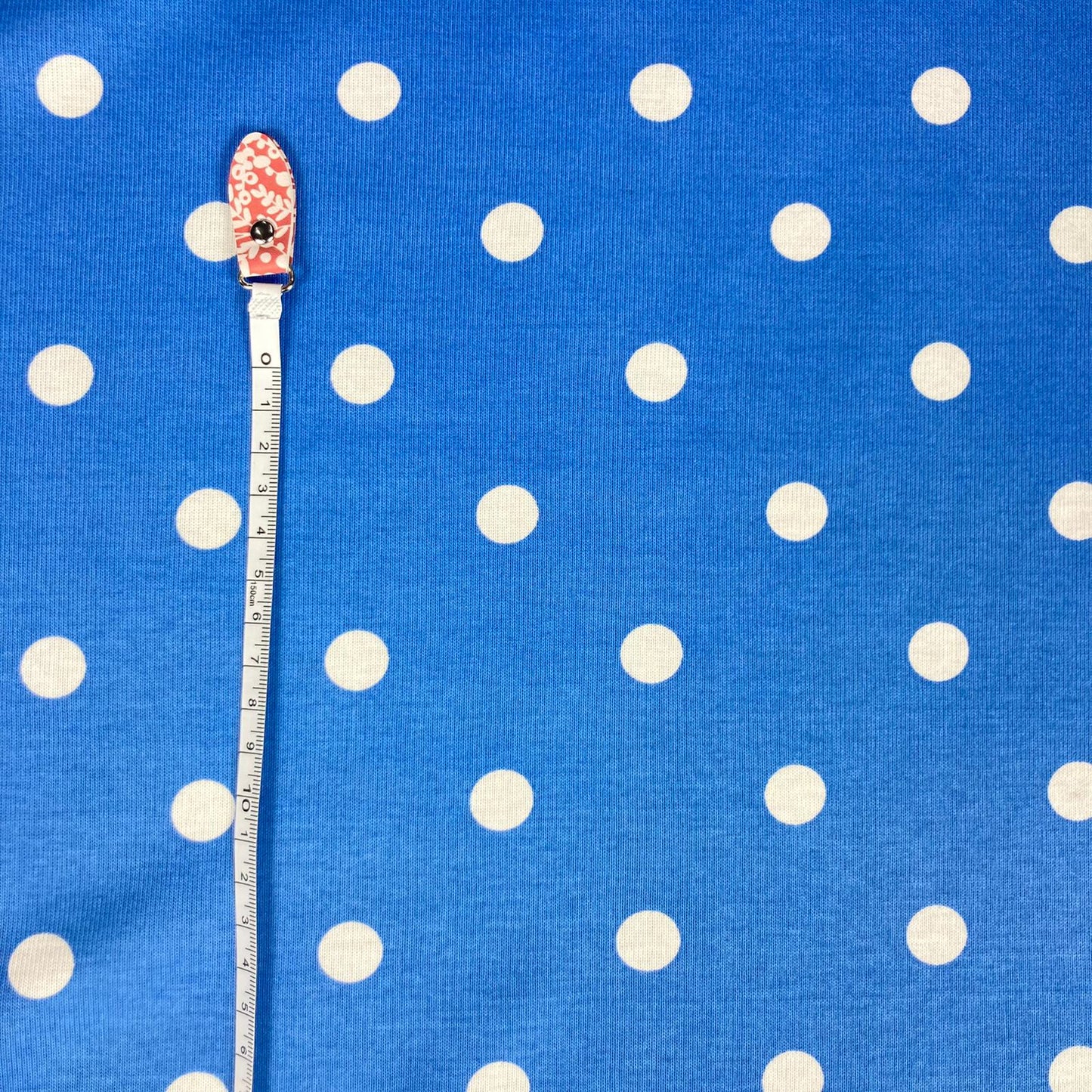 1x1 rib knit blue background with white dots