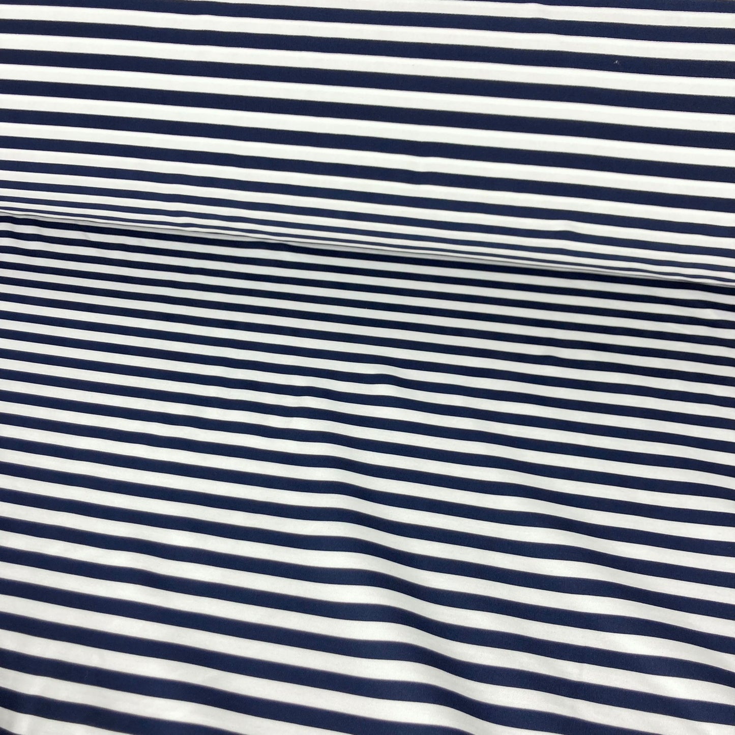 Lycra with dark blue horizontal stripes